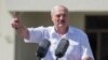 BELARUS -- Belarusian President Alyaksandr Lukashenka gestures as he delivers a speech during a rally of his supporters near the Government House on Independence Square in Minsk, August 16, 2020