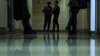 RUSSIA -- Police officers stand in a hallway of a business center, which houses the office of opposition leader Aleksei Navalny's Anti-Corruption Foundation (FBK), in Moscow, January 27, 2021