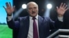 Belarusian President Alexander Lukashenko waves to his supporters at the forum of Union of Women in Minsk, Belarus September 17, 2020. Tut.By via REUTERS ATTENTION EDITORS - THIS IMAGE WAS PROVIDED BY A THIRD PARTY. MANDATORY CREDIT