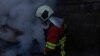 Ukraine -- Rescue workers at the site of Russian strike, Kyiv, 7Apr2025